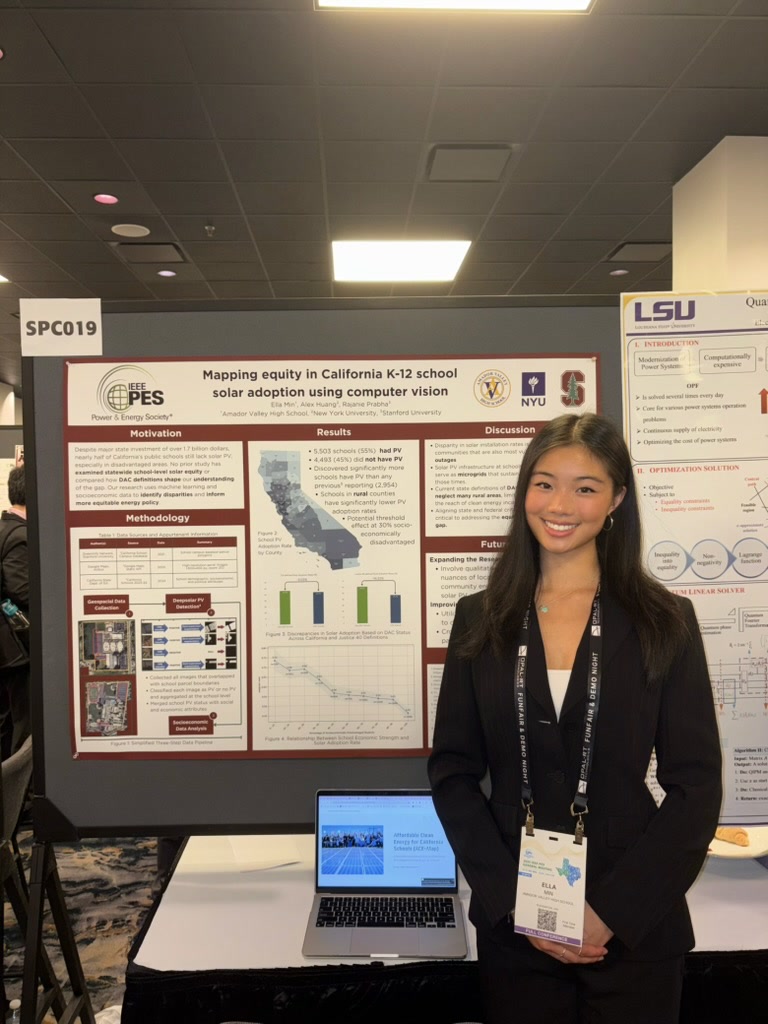 Ella stands beside her research poster about mapping equity in California K–12 school solar adoption.