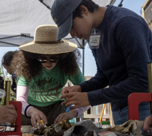 Students engaged in a hands-on Santa Clara County Youth Climate Initiative project.